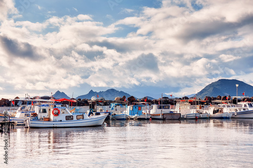 Traditional wooden fishing boats docked at the harbor in Turgutreis, Bodrum, Mugla, Turkey.