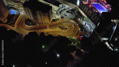 Monaco city town Monte Carlo Drone 4K flight via casino and sea yacht port night and evening time