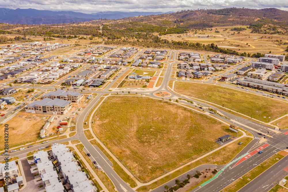 Aerial view of streets, houses and parks in the newly established suburb of Coombs in Canberra, Australia