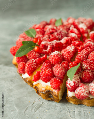 Raspberry cake on gray background