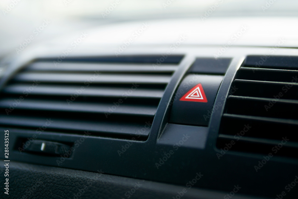 Car Emergency Light Button Pressing the Red Triangular Car Hazard Warning Button