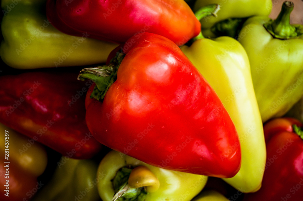 Natural-looking red and green peppers grown without the use of harmful substances. Natural-looking red and green peppers grown without the use of harmful substances.