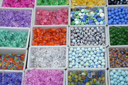 Multi colored beads and tools for making jewelry and crafts