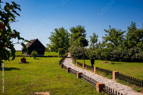 Old rustic wooden house in village Moravski Konaci near the Velika Plana in Serbia photo
