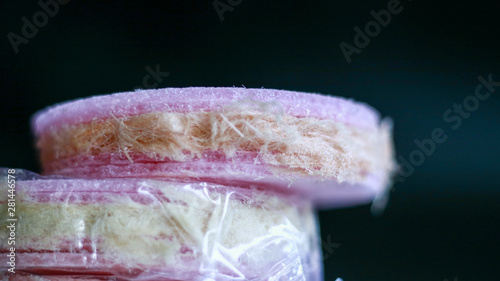 Rambut Nenek or Arumanis (Cotton Candy with Crackers) on black background. Indonesian Traditional Food. photo