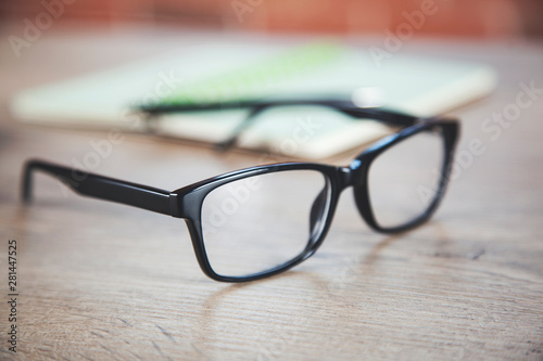 glasses with notepad