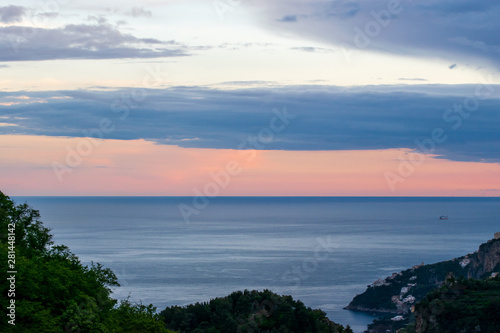 Sunset over the Tyrranean sea, viewed from The Terrace of Infinity or Terrazza dell'Infinito, Villa Cimbrone, Ravello village, Amalfi coast of Italy photo