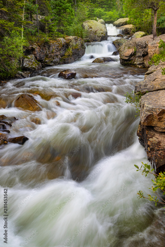 Fototapeta premium Copeland Falls flowing in Rocky Mountain National Park