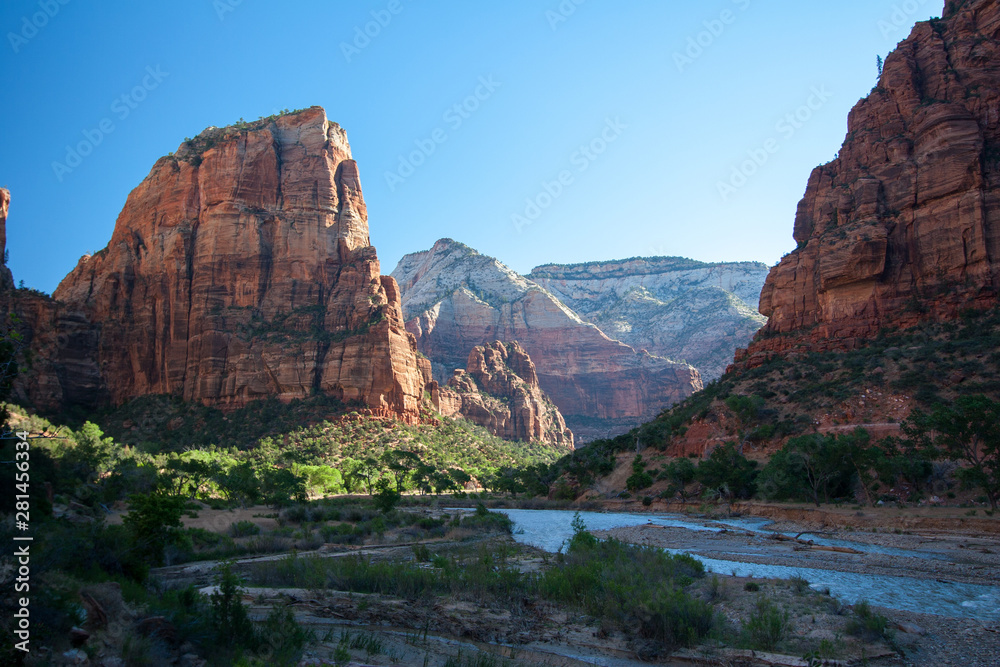 Angels Landing and the Virgin River in Zion National Park, Utah on a clear and cloudless summer morning.