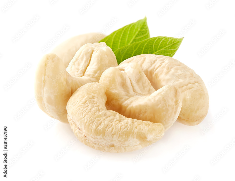 Cashew nuts with leaves in closeup Cashew nuts with leaves in closeup