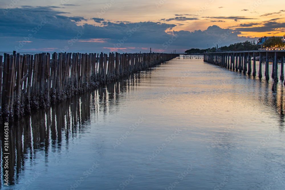 Beautiful of The walkway bridge in evening at Bang Khun Thian sea view, Bang Khun Thian, Bangkok.