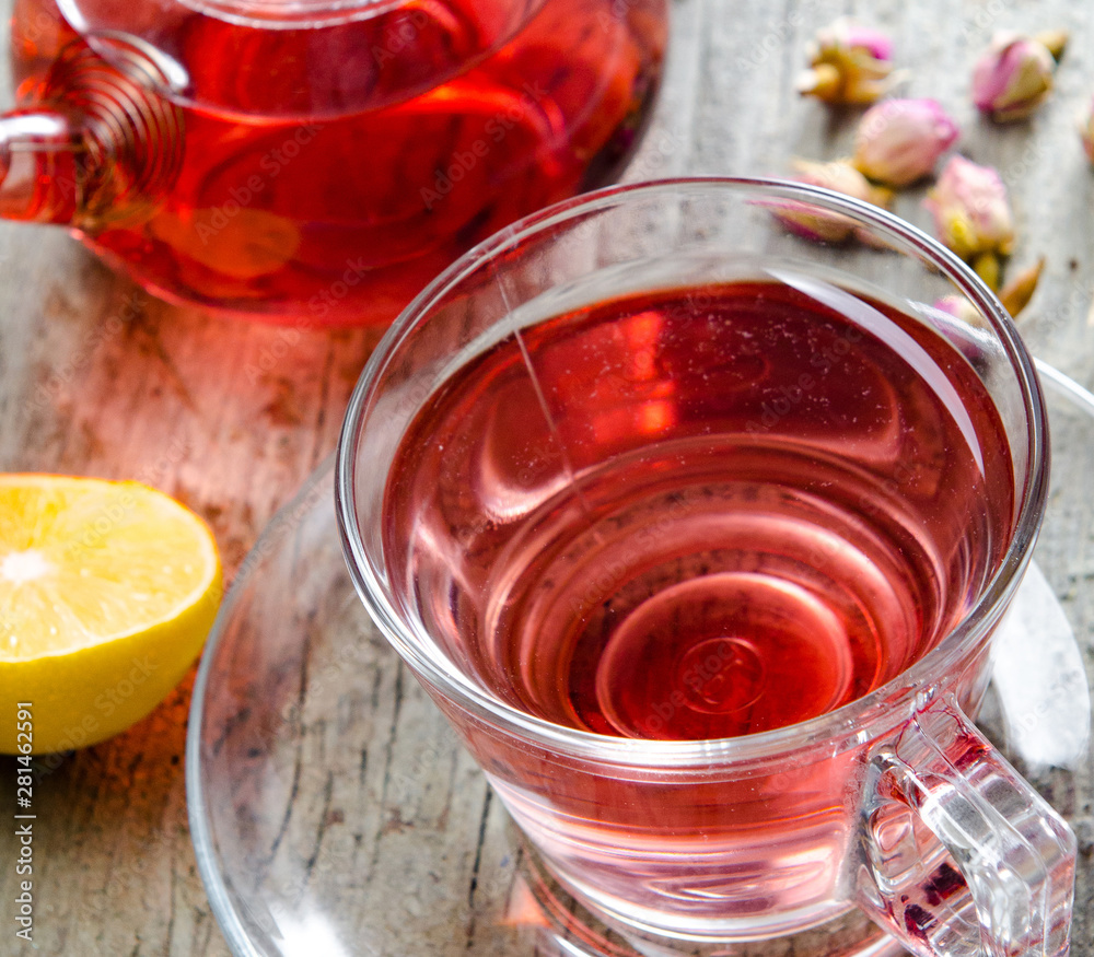 Fruit berry tea in the cup served on table Fruit berry tea in the cup served on table
