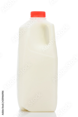 A one quart plastic bottle of milk, with red cap and no label