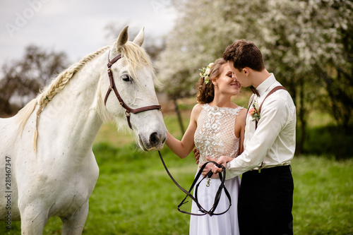 girl and boy with horse