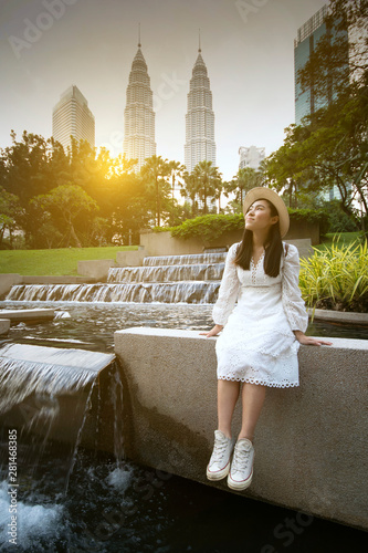 Young beautiful Asain Woman is enjoy traveling in Kuala Lumpur, Malaysia.