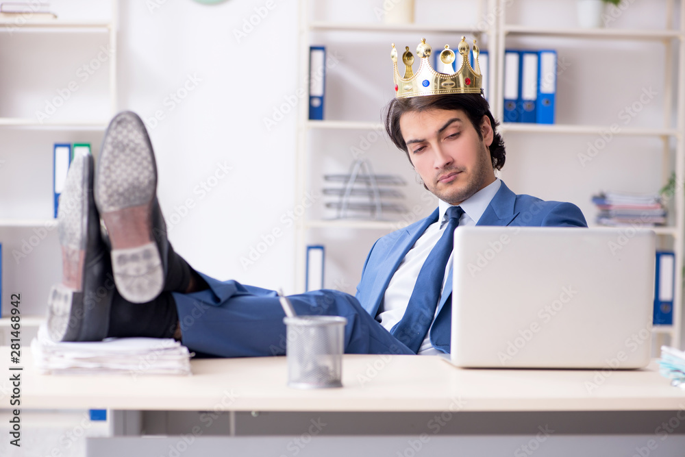 Young king businessman working in the office