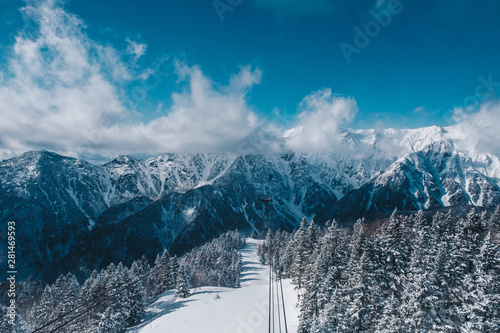 Shinhotaka Ropeway, Cable car station, Takayama Gifu, Japan. allows visitors to take in spectacular views as the crystal-clear blue sky in a grand panoramic view of the Northern Japan Alps. in winter photo