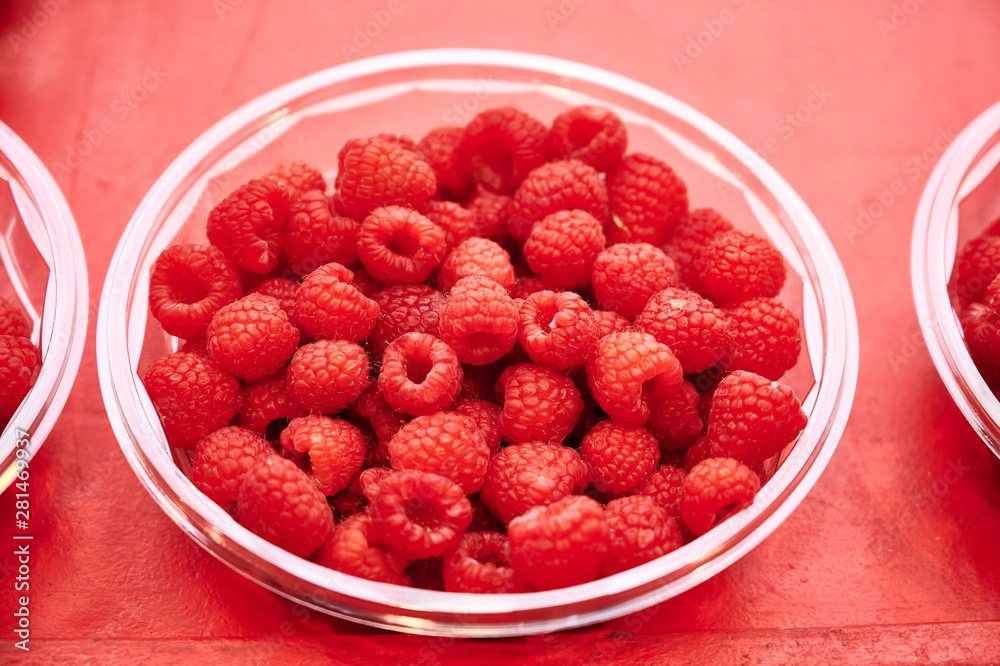 Raspberries are for sale in Hötorget's square store Raspberries are for sale in Hötorget's square store
