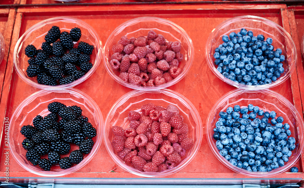 Raspberries are for sale in Hötorget's square store Raspberries are for sale in Hötorget's square store