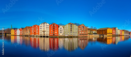 Photos Colorful timber houses surrounding river Nidelva in the Brygge district of Trond