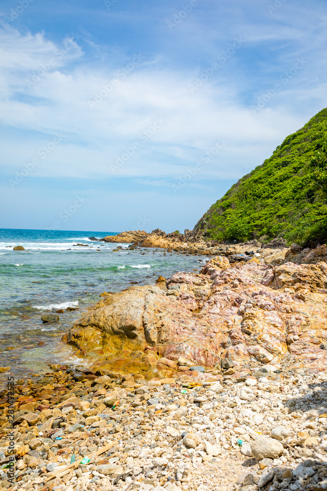 Wild beach without people next to Sanya bay, Hainan, China Wild beach without people next to Sanya bay, Hainan, China