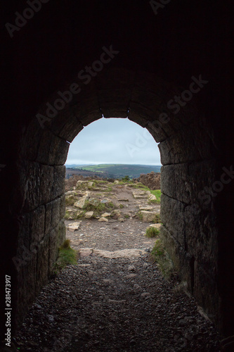 View of Irish Countryside from a Dark Tunnel