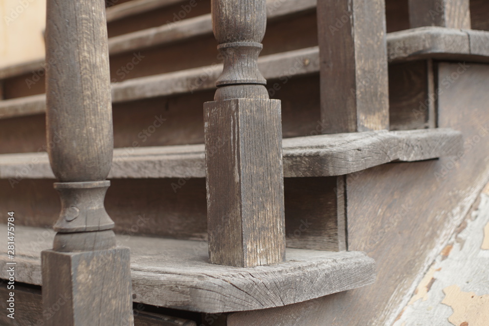 Naklejka premium old wooden stairs close up