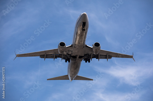 Airplane during landing approach at the airport