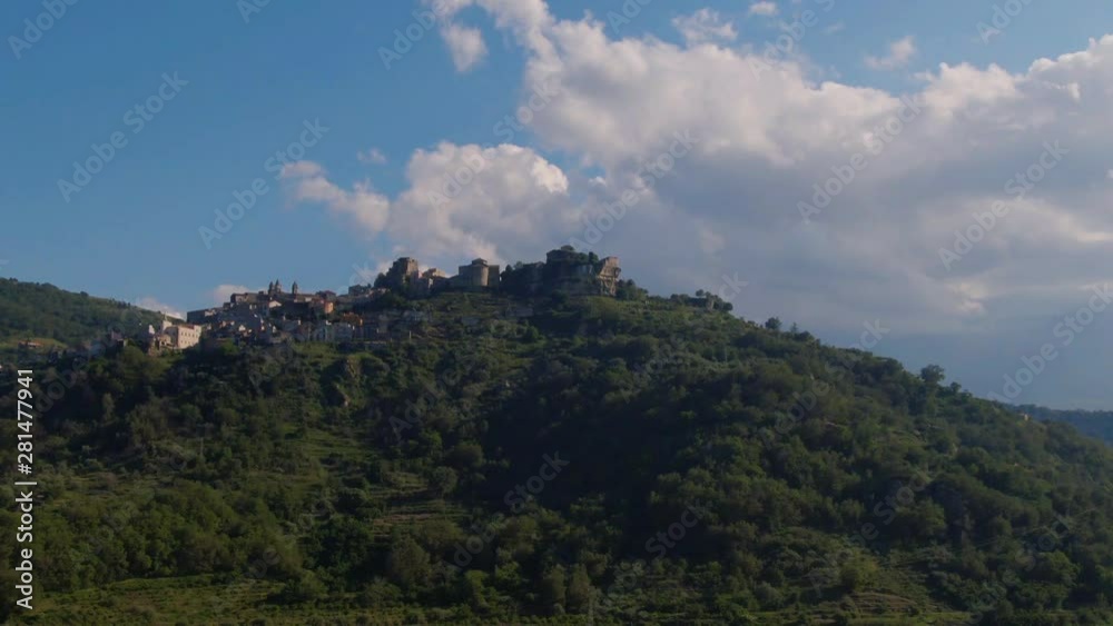 Aerial descending view of the hilltop town of Castiglione in Sicily Aerial descending view of the hilltop town of Castiglione in Sicily