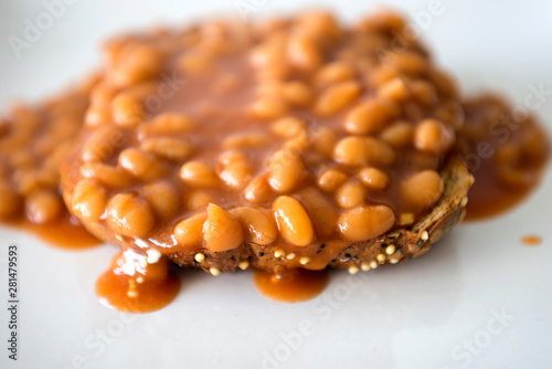 close up of baked beans on toast