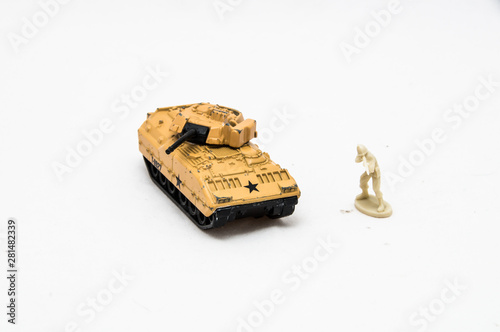 Miniature toy soldier with tank 