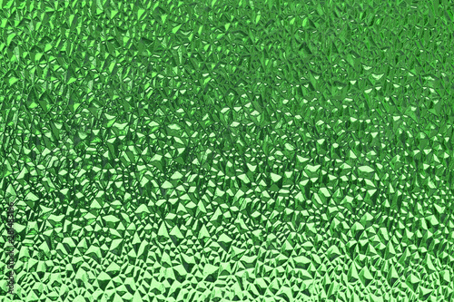 Green ribbed glass surface. Abstract background. Design element.
