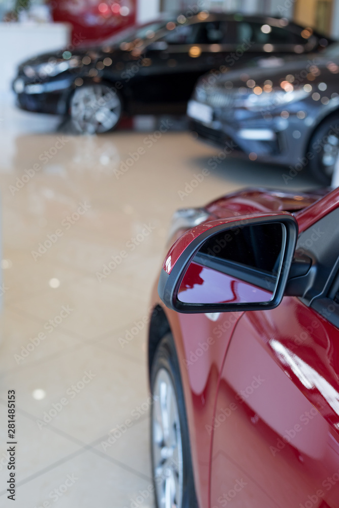 Fototapeta premium Car auto dealership. New cars at dealer showroom. Prestigious vehicles.