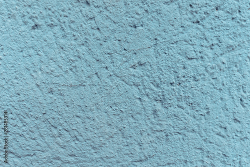 Light blue old painted wall background. Old texture.