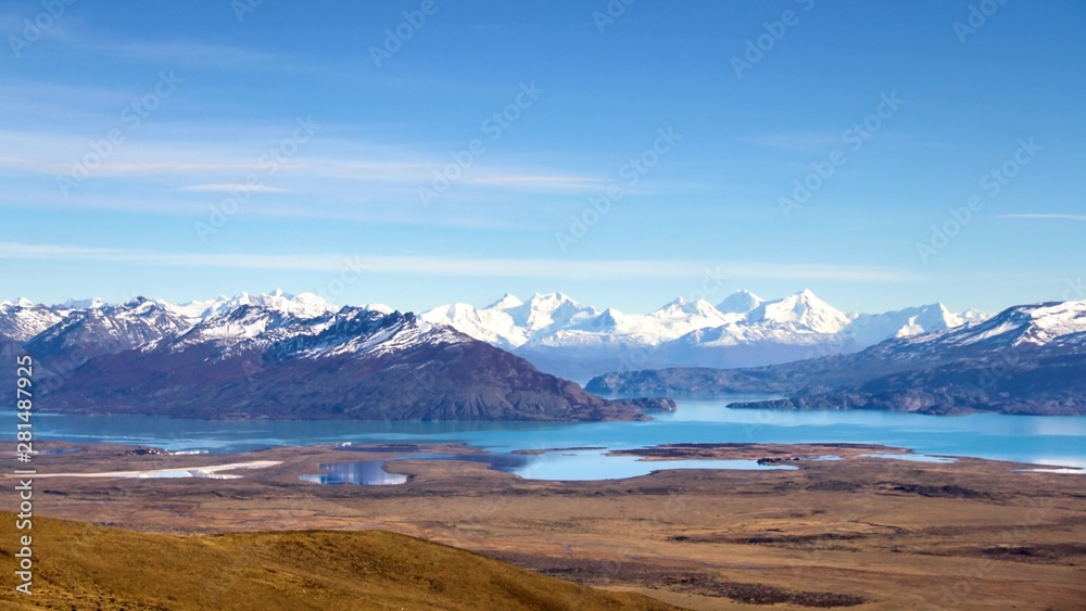 Scenic panoramic view to beautiful valley with turquoise lakes with snow-capped mountains on background in Los Glaciares national park,Patagonia,Argentina