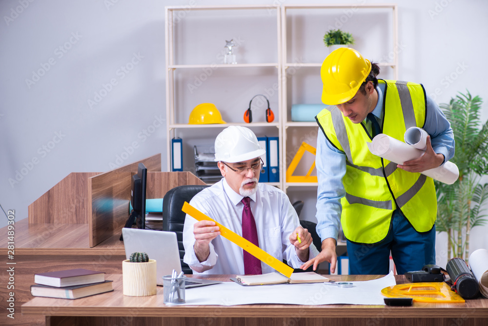 Two architects working on the project Two architects working on the project