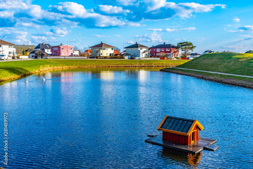 Tableau sur toile Duck house at a moat around town Fredrikstad in Norway