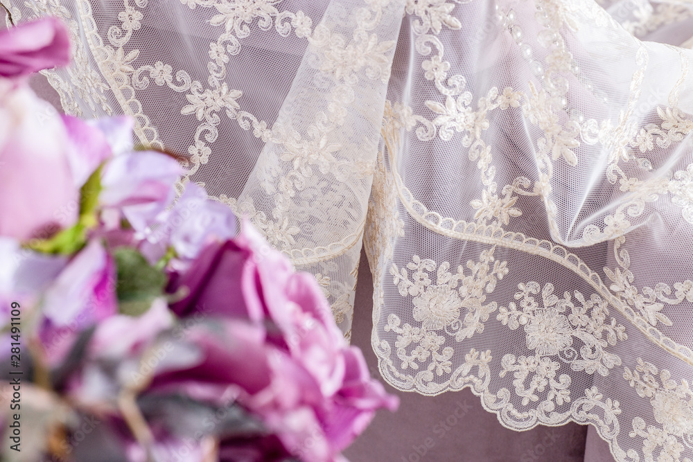 Fototapeta premium Beautiful tulle in the interior. Sheer Curtains Fabric Sample. Texture, Background, Pattern. 