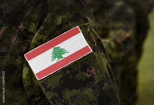 Flag of Lebanon on soldiers arm (collage).