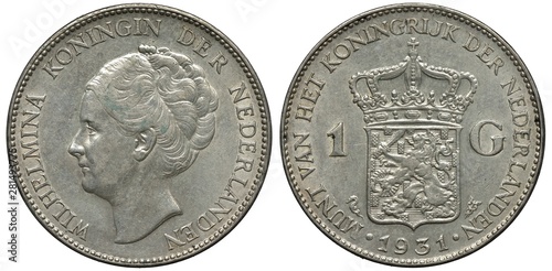 The Netherlands Dutch silver coin 1 one gulden 1931, head of Queen Wilhelmina left, crowned shield with lion holding sword and bundle of arrows divides denomination, date below,