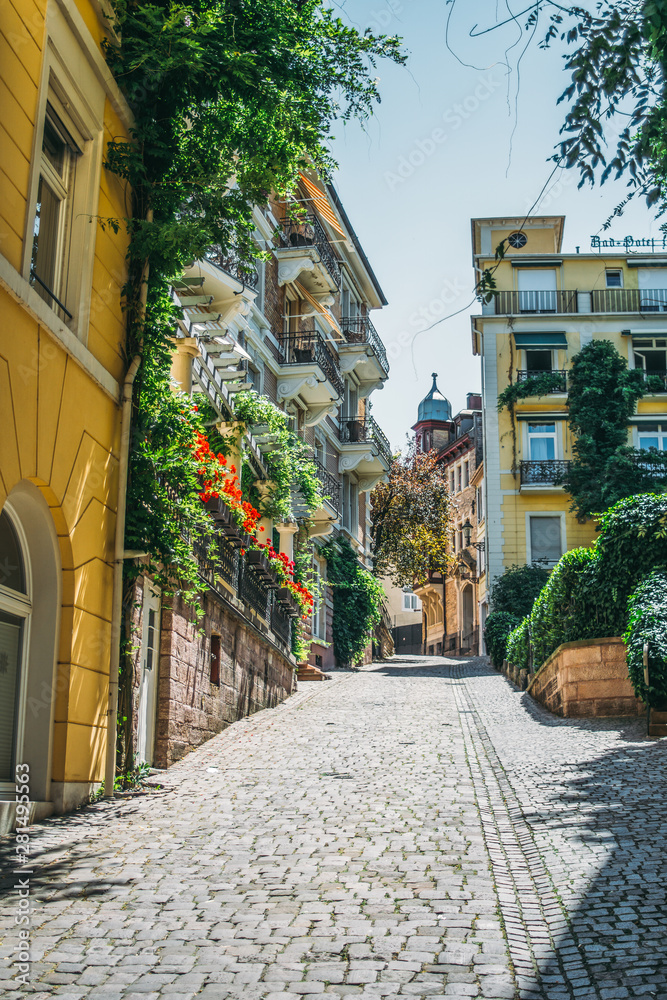 Fototapeta premium Baden Baden in Germany, street with flowers and colorful buildings