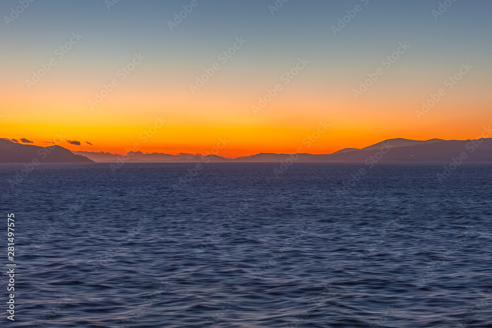 Dreamlike profile of Aegean Sea islands at sunset Dreamlike profile of Aegean Sea islands at sunset