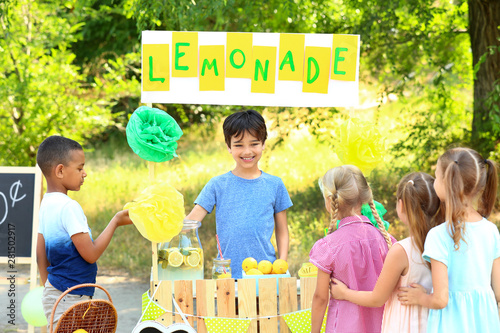 Cute little children sellin...