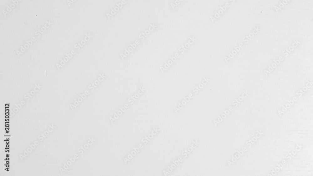 Crumpled plastic bottle moving on white background, environment pollution