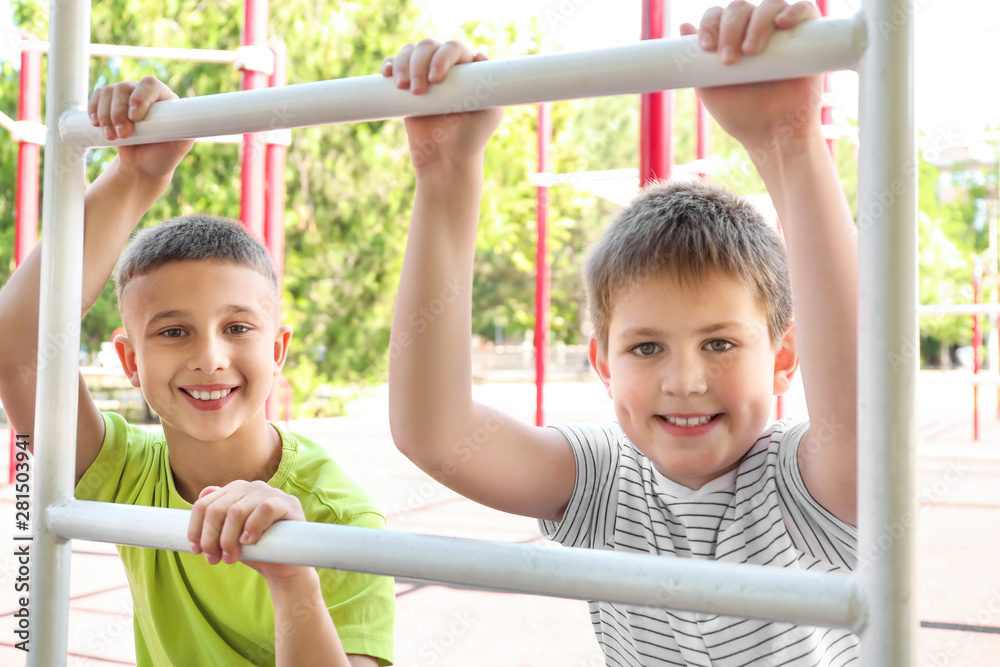Fototapeta premium Cute little children on playground