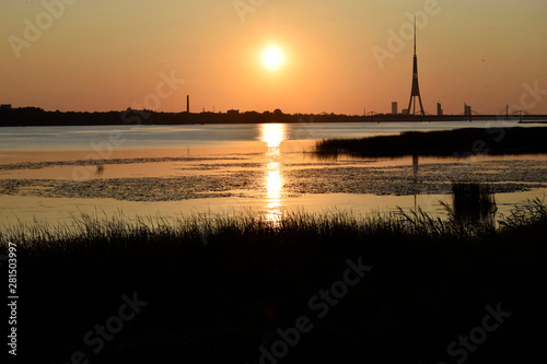 Sunset, the river, summer, evening.Natural landscape of Belarus, Russia and Baltic.