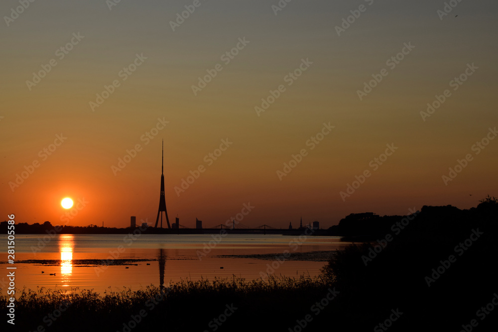 Sunset, the river, summer, evening. Natural landscape of Belarus, Russia and Baltic.