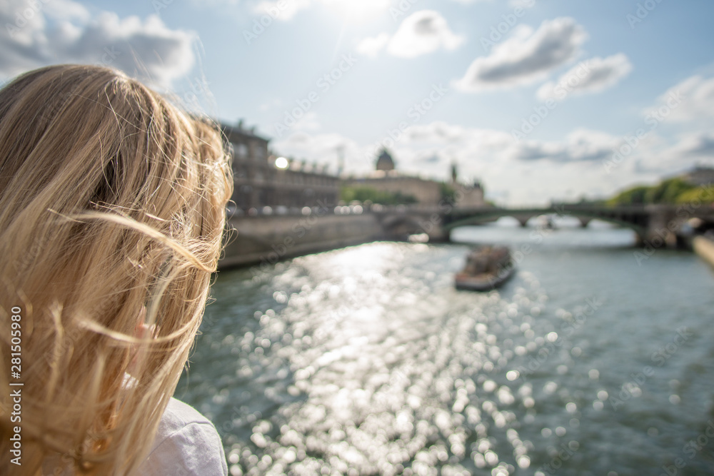 Fototapeta premium Girl watching Boats on Seine, Paris