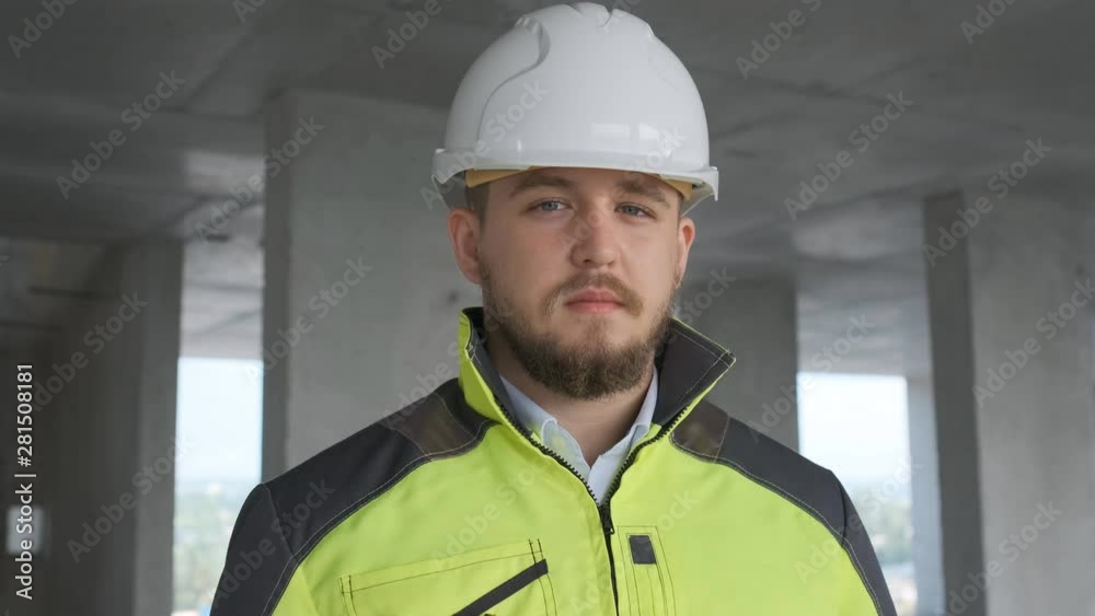 Architect or engineer working, browsing building project indoor of construction site with blueprint plan. businessman worker, man male construction engineers or architects working people. Engineer In Architect or engineer working, browsing building project indoor of construction site with blueprint plan. businessman worker, man male construction engineers or architects working people. Engineer In