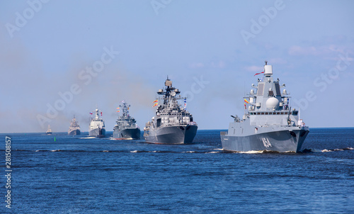 Obraz na płótnie A line ahead of modern russian military naval battleships warships in the row, n
